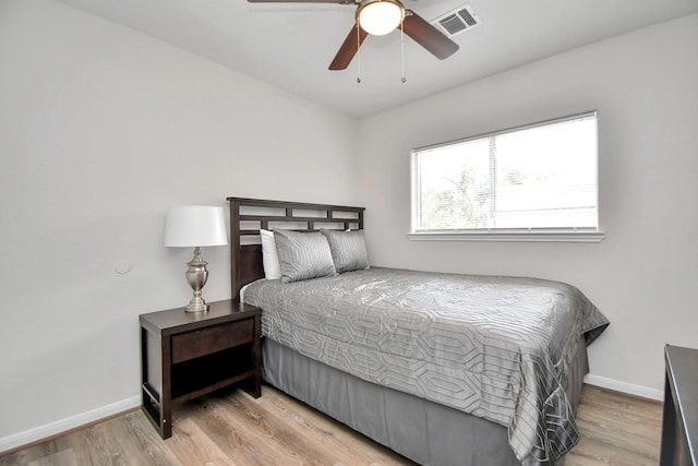 8102 Rhobell St, Houston, TX 77078 - bedroom featuring baseboards, visible vents, and light wood-style flooring