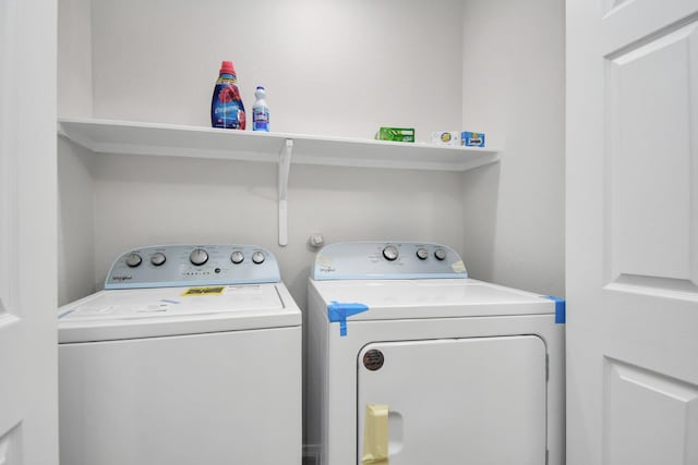 8102 Rhobell St, Houston, TX 77078 - washroom featuring laundry area and washer and clothes dryer