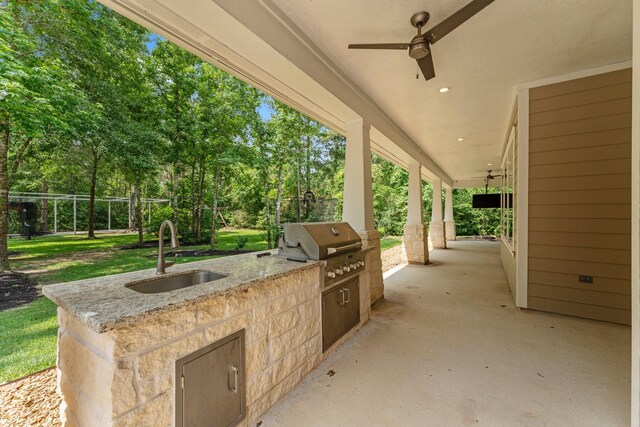 26111 Upper Beacon Pl, Montgomery, TX 77316 - view of patio with a sink, ceiling fan, exterior kitchen, and area for grilling