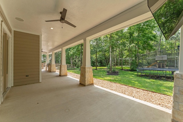 26111 Upper Beacon Pl, Montgomery, TX 77316 - view of patio with a ceiling fan and a trampoline