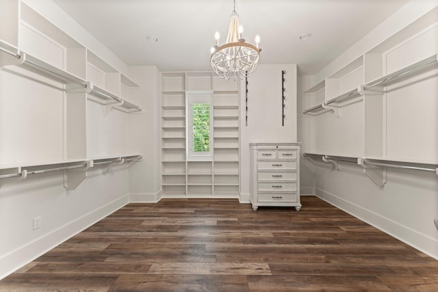 26111 Upper Beacon Pl, Montgomery, TX 77316 - spacious closet featuring a notable chandelier and dark wood-style floors