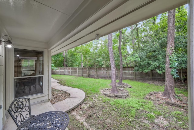 view of yard with a fenced backyard