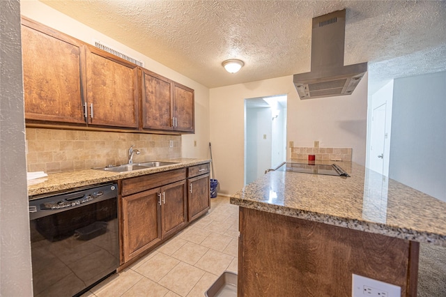 kitchen featuring light stone countertops, island range hood, a sink, backsplash, and black appliances
