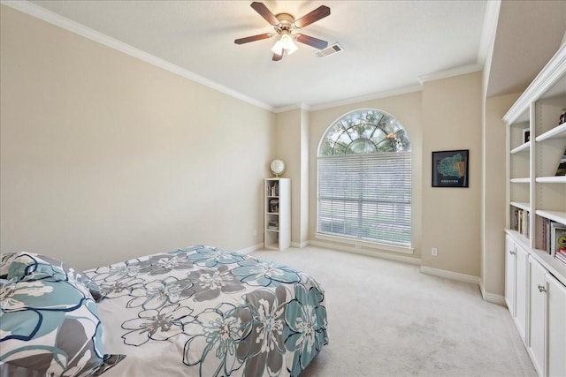 bedroom featuring crown molding, baseboards, light colored carpet, and visible vents