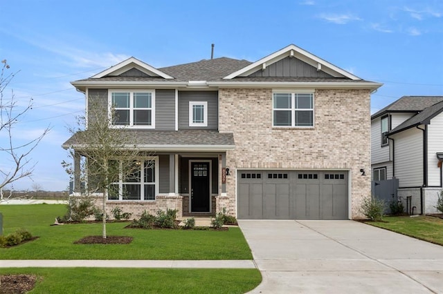 craftsman house featuring concrete driveway, brick siding, an attached garage, and a front lawn