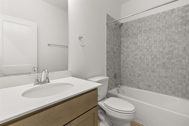 full bathroom featuring vanity, shower / bathing tub combination, and toilet