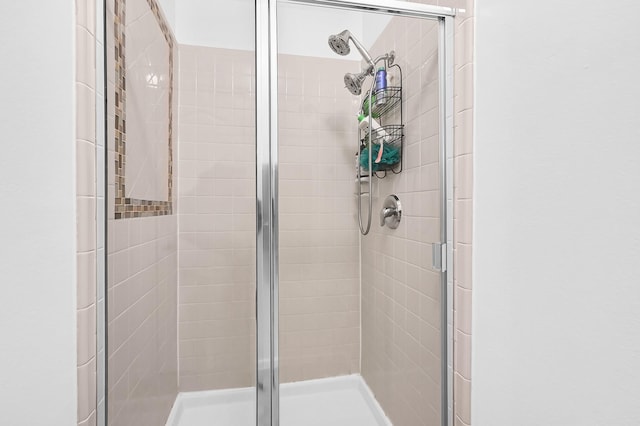 bathroom with a stall shower