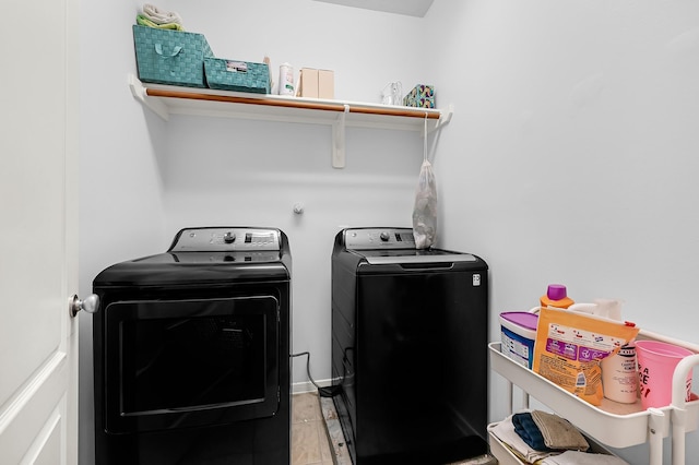 laundry room featuring laundry area and washing machine and dryer