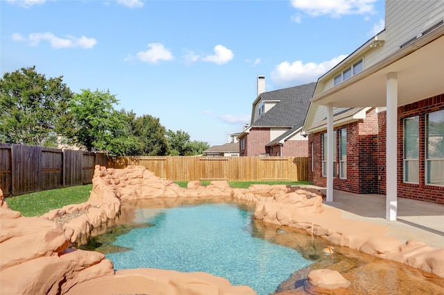 10007 Autumn Lake Trl, Pearland, TX 77584 - view of swimming pool featuring a fenced backyard and a patio area