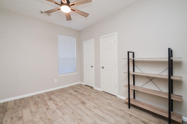 15027 Wildberry Creek Ct, Cypress, TX 77433 - unfurnished bedroom featuring visible vents, baseboards, and wood finished floors