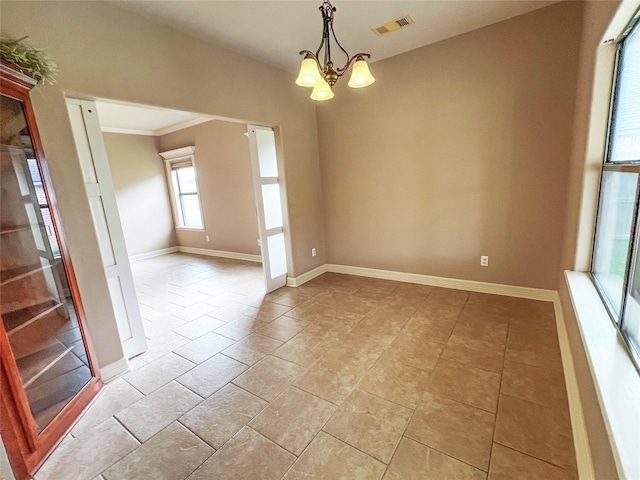 110 Hummingbird Ct, Richwood, TX 77566 - empty room with crown molding, baseboards, a chandelier, and visible vents