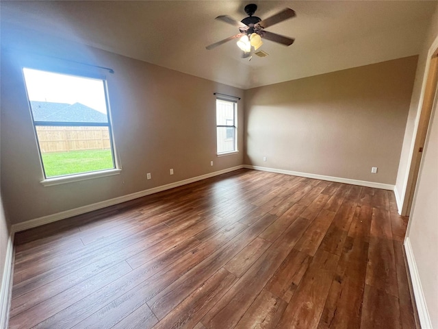 110 Hummingbird Ct, Richwood, TX 77566 - unfurnished room with baseboards, a ceiling fan, dark wood-style flooring, and visible vents