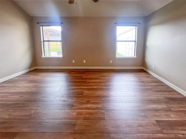 110 Hummingbird Ct, Richwood, TX 77566 - empty room featuring baseboards, ceiling fan, and hardwood / wood-style floors
