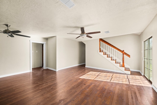 unfurnished living room featuring ceiling fan, a textured ceiling, and wood finished floors