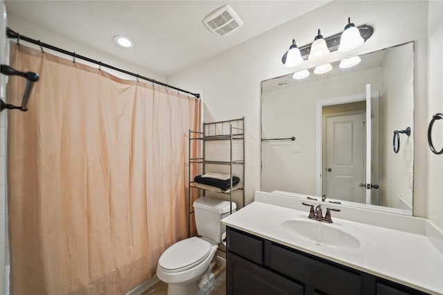 21023 Barrett Woods Dr, Richmond, TX 77407 - bathroom featuring toilet, visible vents, a shower with shower curtain, and vanity