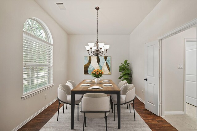 21023 Barrett Woods Dr, Richmond, TX 77407 - dining room featuring visible vents, baseboards, a chandelier, and a wealth of natural light