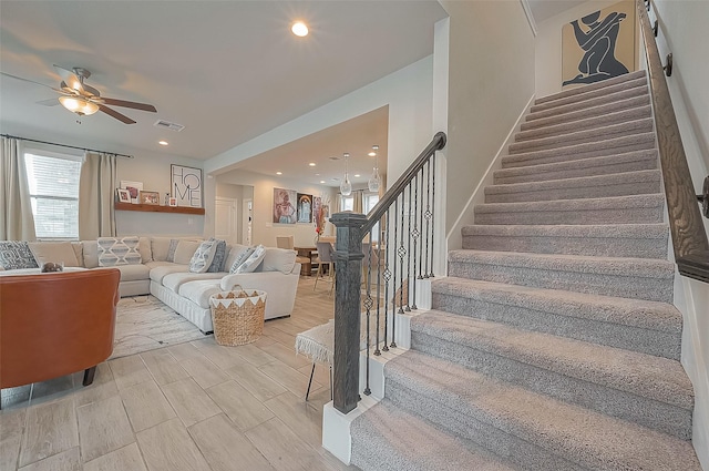 23611 Blackhaw Blossom Ln, Katy, TX 77493 - living area with stairway, ceiling fan, and recessed lighting