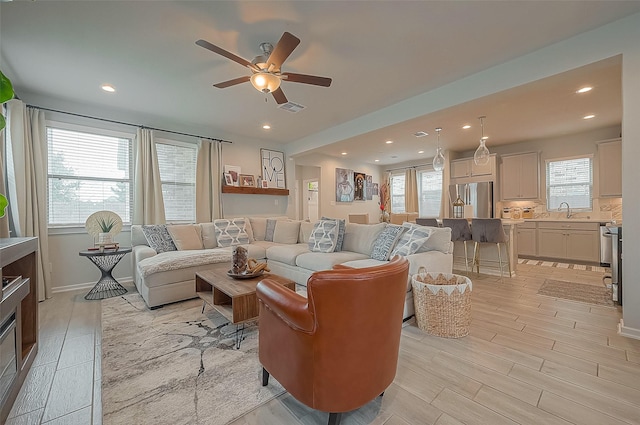 23611 Blackhaw Blossom Ln, Katy, TX 77493 - living room featuring healthy amount of natural light, ceiling fan, recessed lighting, and light wood finished floors