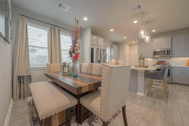23611 Blackhaw Blossom Ln, Katy, TX 77493 - dining space with visible vents, recessed lighting, and baseboards
