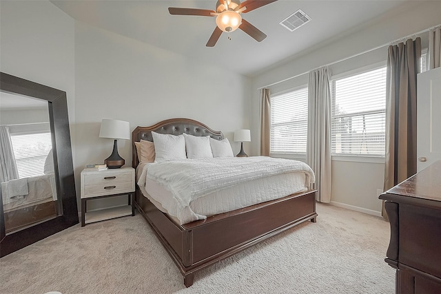 23611 Blackhaw Blossom Ln, Katy, TX 77493 - bedroom with lofted ceiling, light carpet, multiple windows, and a ceiling fan