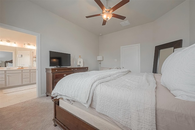 23611 Blackhaw Blossom Ln, Katy, TX 77493 - bedroom featuring ceiling fan, connected bathroom, and light carpet