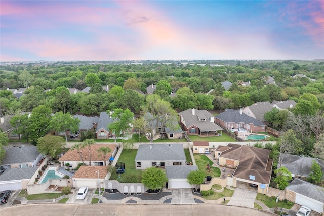 aerial view at dusk with a residential view