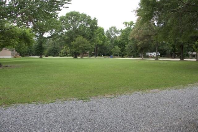surrounding community featuring a lawn