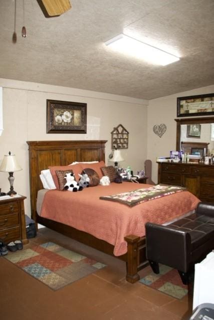 bedroom featuring a textured ceiling