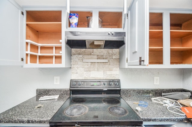kitchen featuring ventilation hood, backsplash, stainless steel electric stove, and white cabinetry