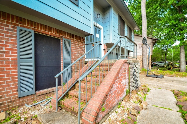 view of home's exterior featuring brick siding