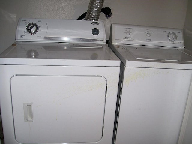 12633 Memorial Dr Unit 122, Houston, TX 77024 - washroom featuring washer and clothes dryer