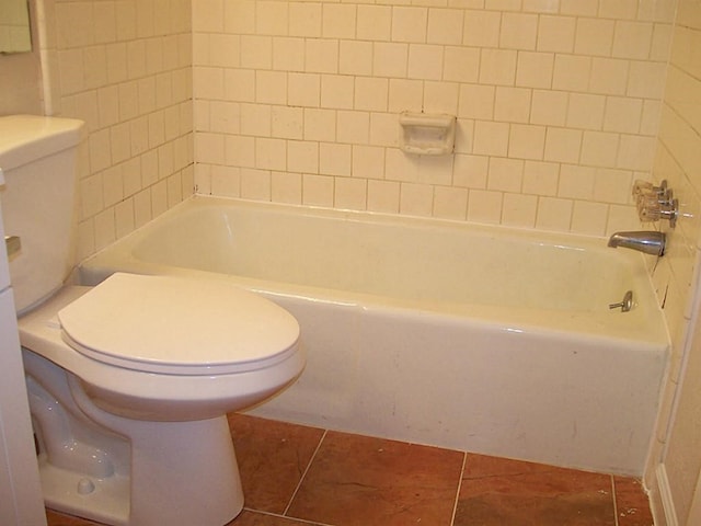 12633 Memorial Dr Unit 122, Houston, TX 77024 - bathroom featuring toilet and tile patterned flooring