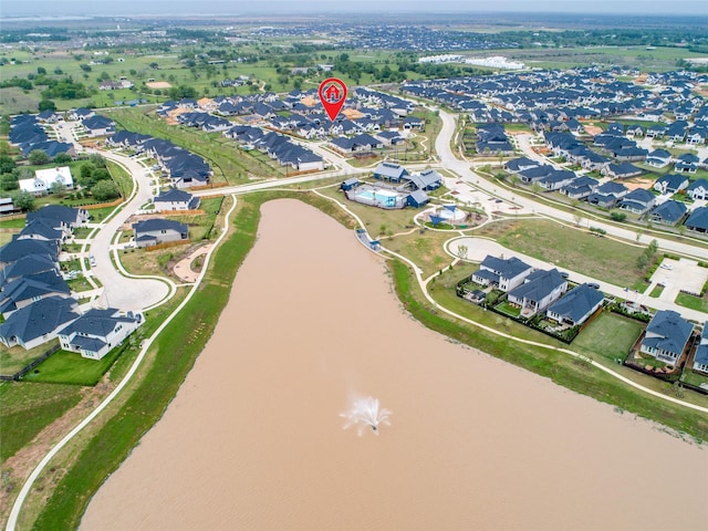 aerial view with a residential view and a water view