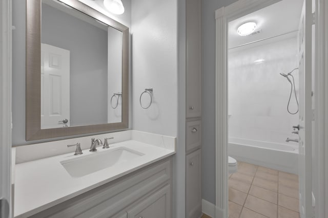 19731 Stone Lake Dr, Tomball, TX 77377 - full bathroom with toilet, tile patterned flooring, vanity, and shower / washtub combination