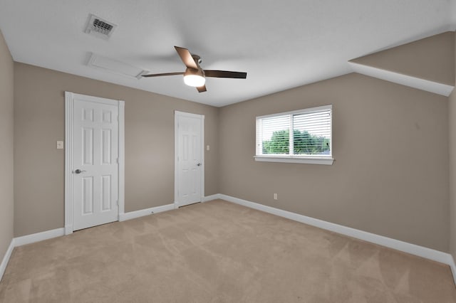 19731 Stone Lake Dr, Tomball, TX 77377 - unfurnished bedroom featuring light carpet, baseboards, attic access, and a ceiling fan