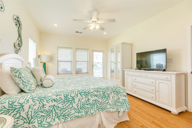 bedroom featuring visible vents, recessed lighting, light wood-style flooring, and a ceiling fan