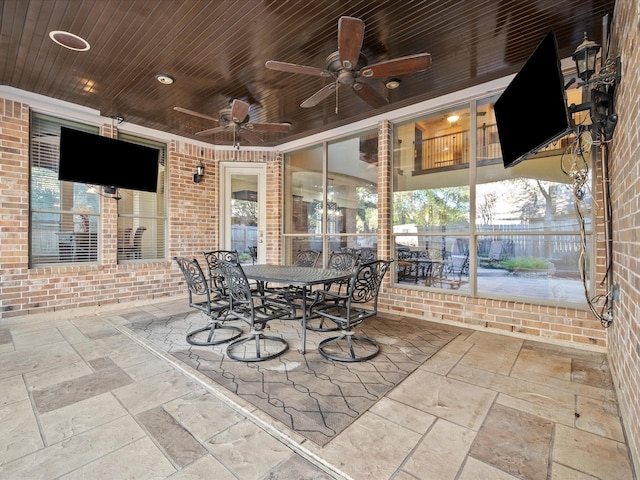 17306 Lake Chelan Ln, Humble, TX 77346 - sunroom featuring outdoor dining area and ceiling fan