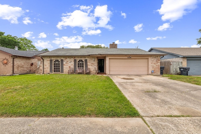 ranch-style house featuring driveway, a chimney, a garage, brick siding, and a front lawn