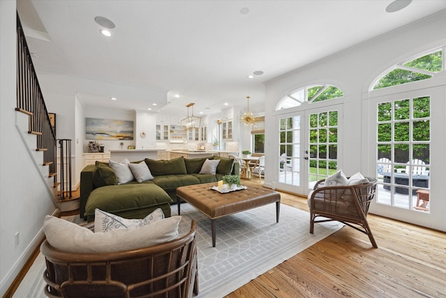 4122 University Blvd, Houston, TX 77005 - living area featuring stairs, recessed lighting, baseboards, and light wood-type flooring