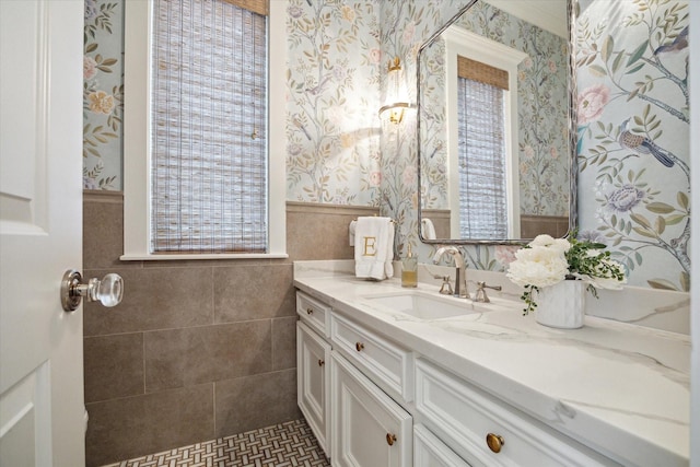 4122 University Blvd, Houston, TX 77005 - bathroom with vanity, wainscoting, and wallpapered walls
