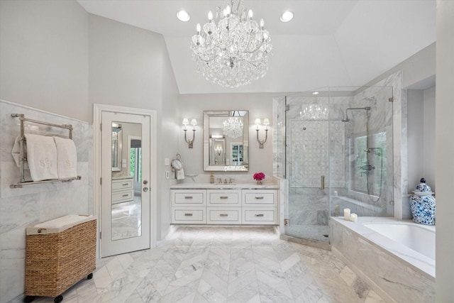 4122 University Blvd, Houston, TX 77005 - full bath featuring vanity, a garden tub, marble finish floor, a marble finish shower, and a notable chandelier
