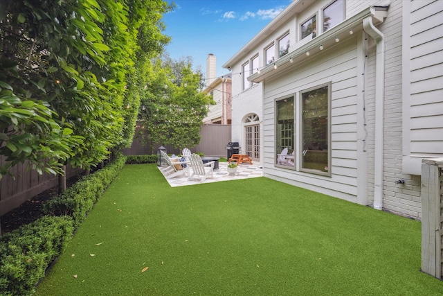 4122 University Blvd, Houston, TX 77005 - view of yard with a fenced backyard and a patio area
