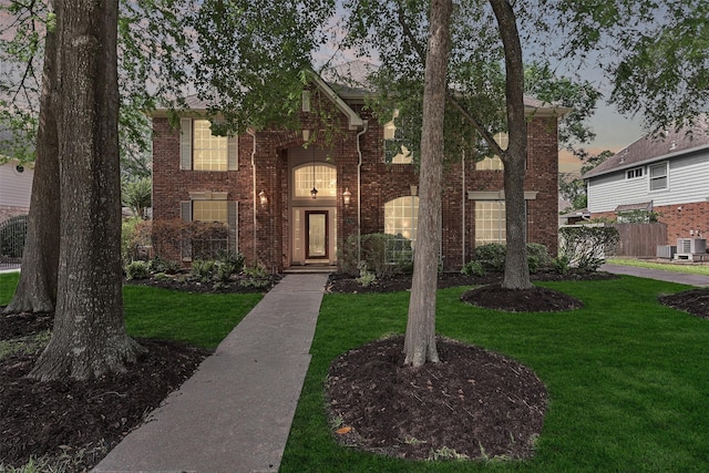 4319 Island Hills Dr, Pasadena, TX 77059 - traditional home with a front lawn and brick siding
