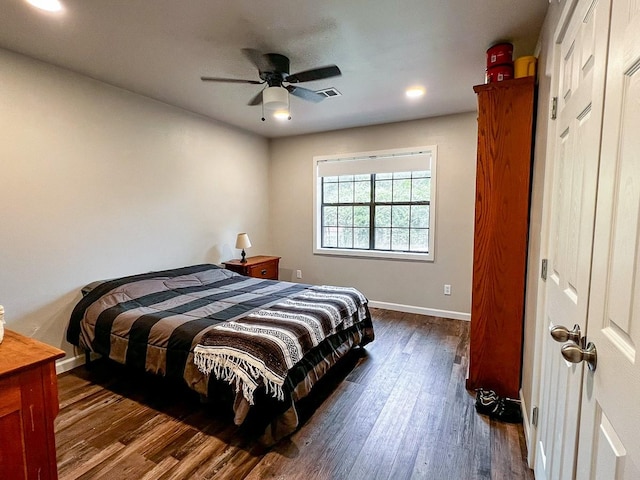 bedroom with visible vents, dark wood-style flooring, baseboards, recessed lighting, and a ceiling fan