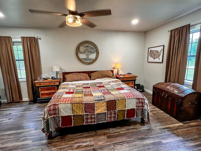 bedroom featuring baseboards, a ceiling fan, recessed lighting, and wood finished floors