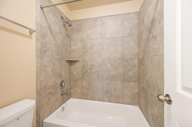 full bathroom with shower / bath combination and toilet