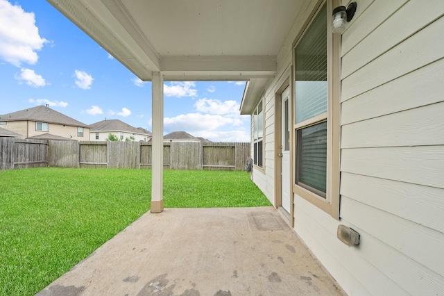 view of yard featuring a patio and a fenced backyard