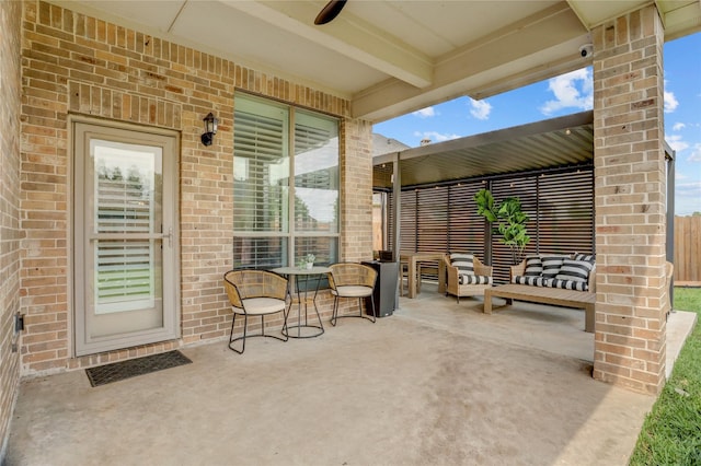 view of patio / terrace featuring a ceiling fan