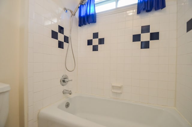 full bathroom featuring shower / bathtub combination and toilet
