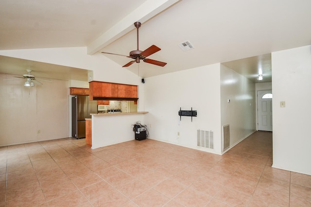unfurnished living room featuring light tile patterned floors, a ceiling fan, and visible vents